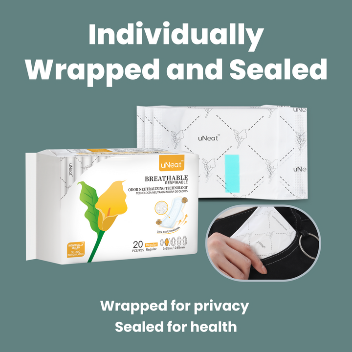 Close-up product photography of uNeat sanitary pads Regular size, individually wrapped and sealed. Wrapped for privacy. Sealed for health