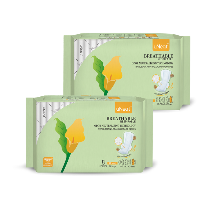 Two green packages of uNeat Breathable Sanitary pads with Odor Neutralizing Technology. Ultra thin, 8 count, 2X Long size (16.73 in / 425 mm). The green packaging features a green leaf logo with a yellow flower (uNeat flower logo).